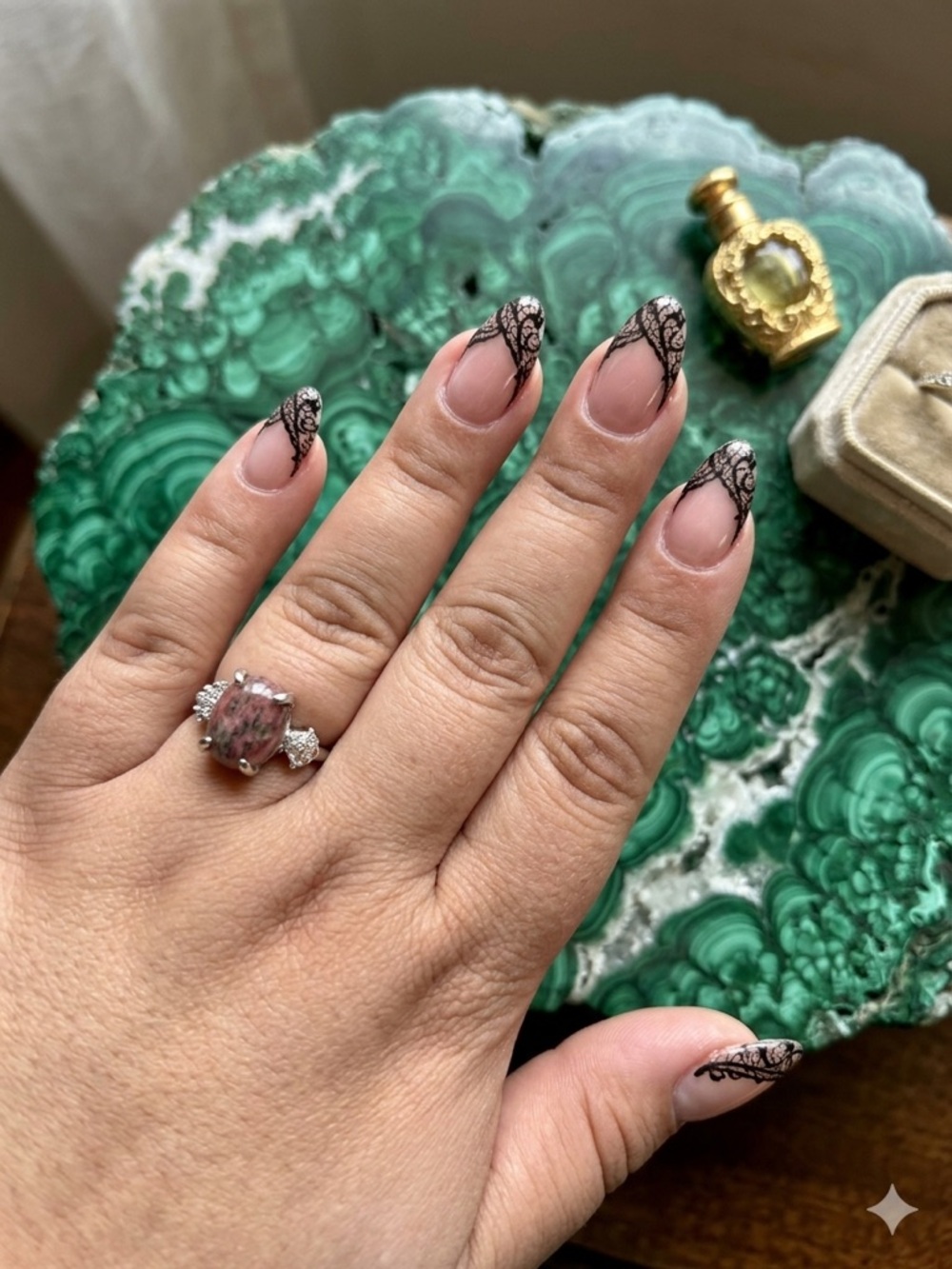 Size 8 oval-cut strawberry quartz ring